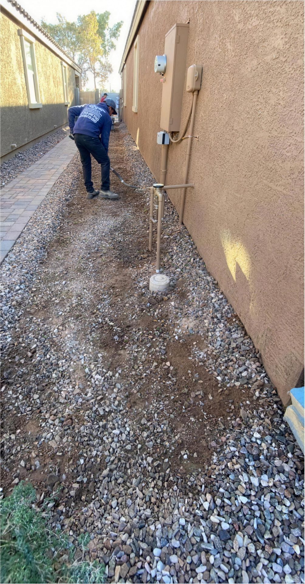 Before: our crew prepping the gravel side yard