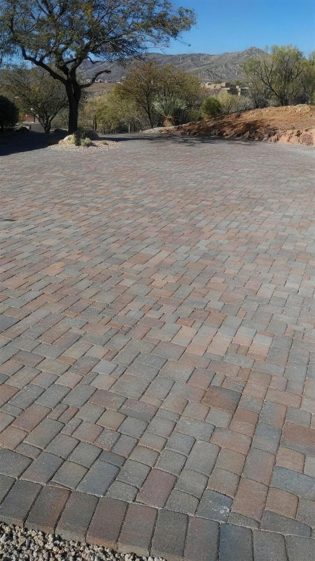 Multi-tone cobble paver driveway in the desert foothills