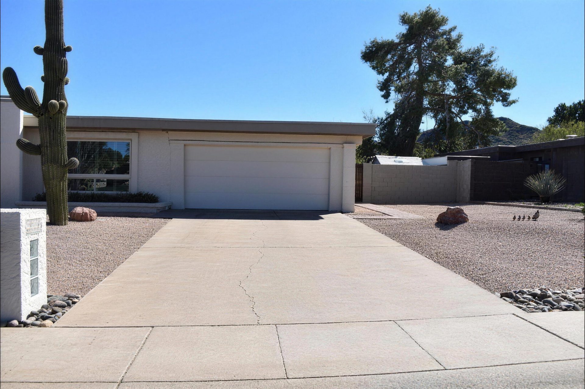 Before: original concrete driveway, cracked down the middle